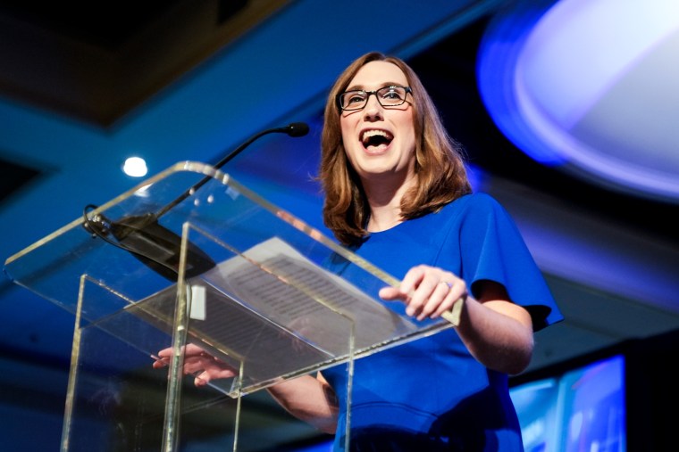 Sarah McBride speaks on stage